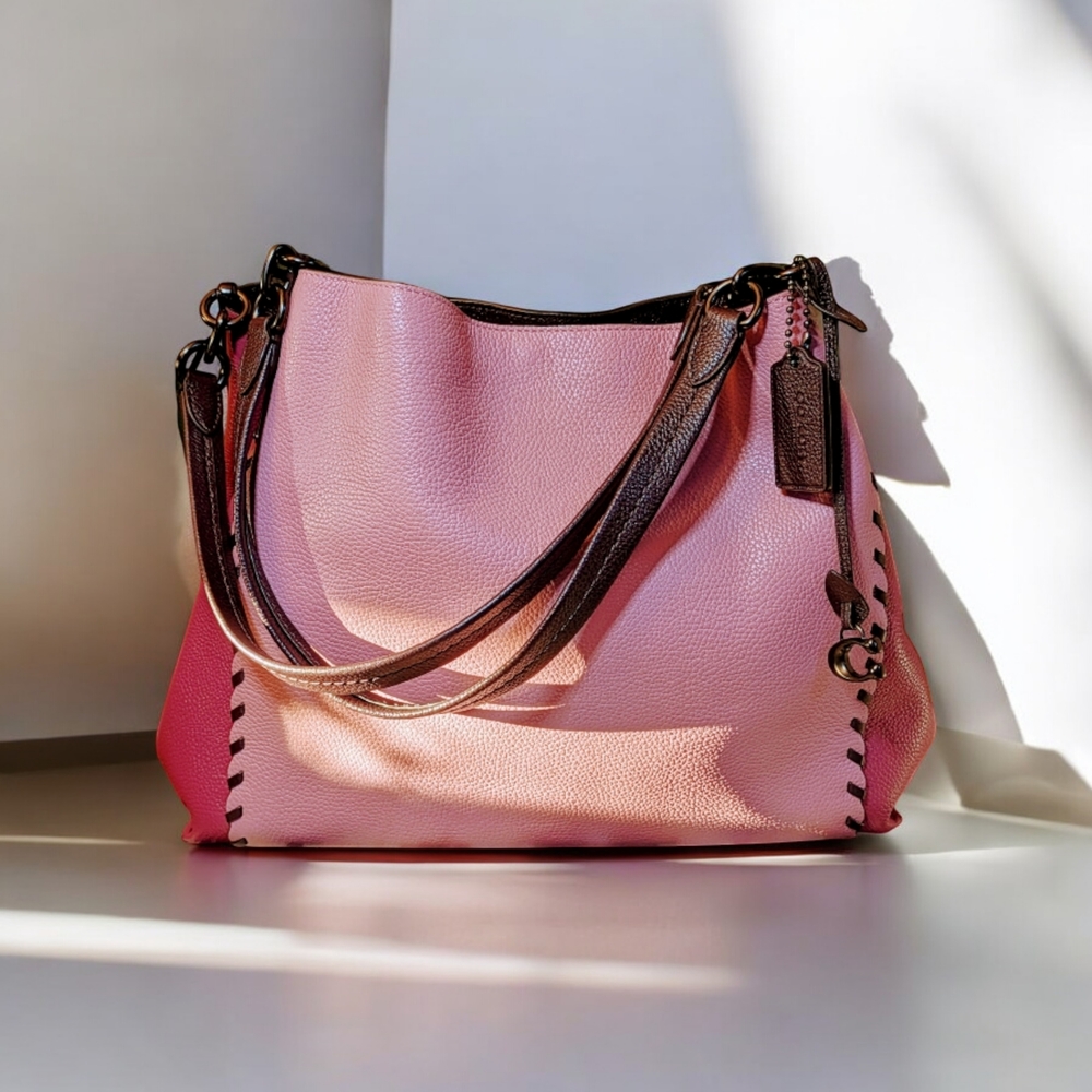 Stylish Pink Coach Leather Shoulder Bag with Structured Shape